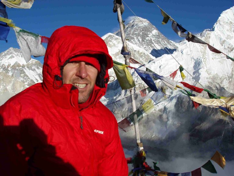 Mountaineering Ireland with Jason Black posing for a pic on the Mt. Everest