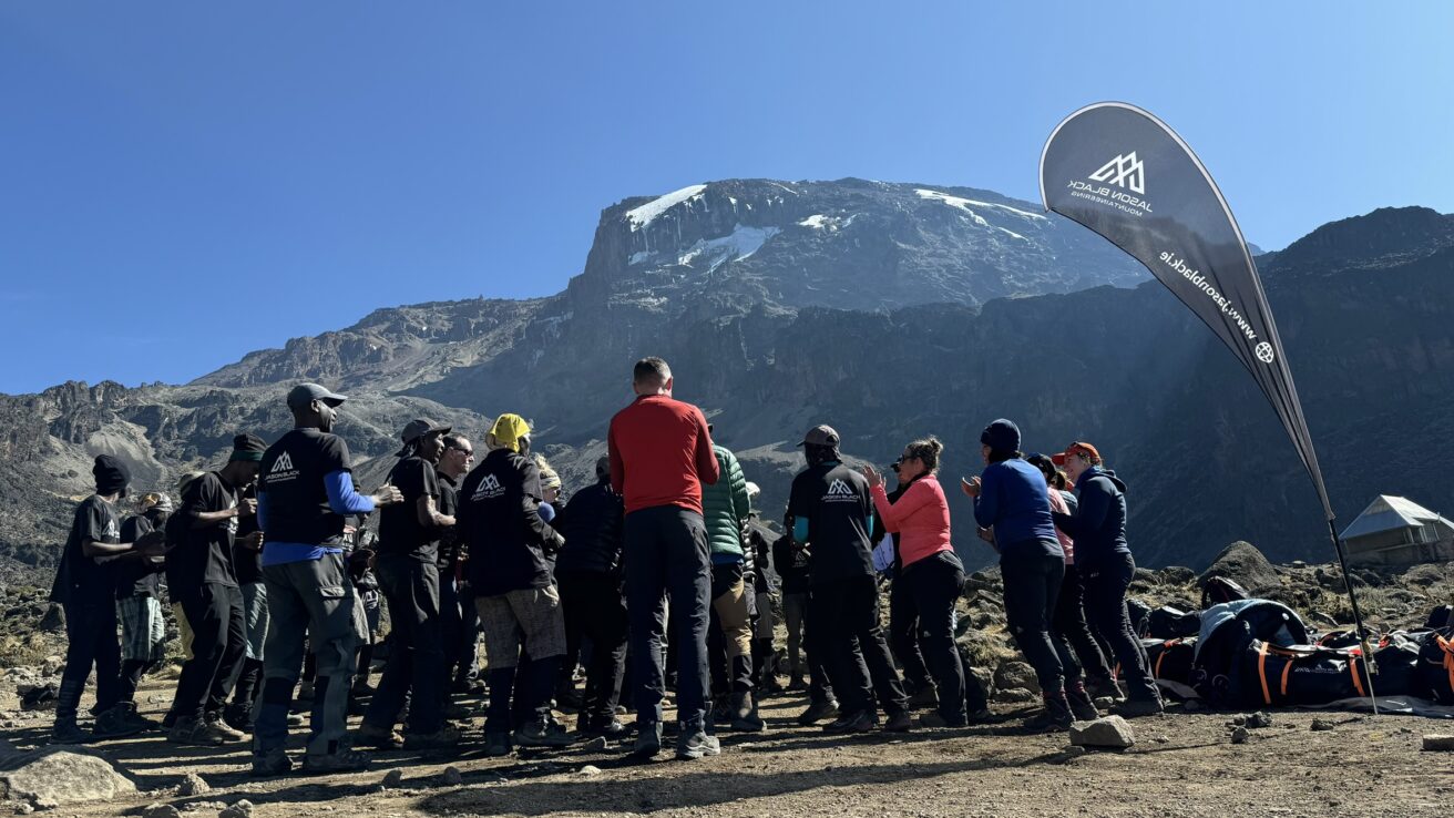 Jason Black leading trekkers through Barranco Camp on Machame Route Kilimanjaro