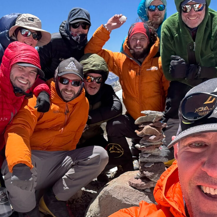 Mountaineers celebrating successful summit of Aconcagua highest peak Western Hemisphere